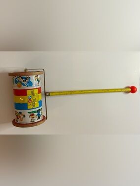 Vintage 50s Fisher-Price Musical Chime Toy with Red and Blue Accents